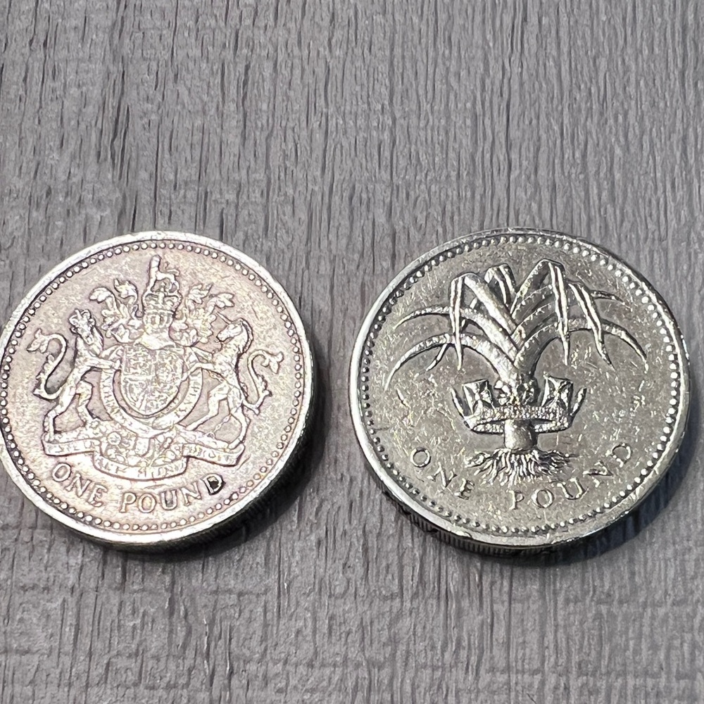 1983 Royal Coat of Arms One Pound &.       1985 Welsh Leek One Pound